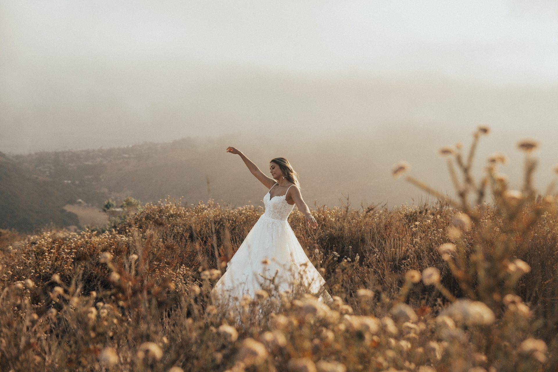Bride in field of flowers
